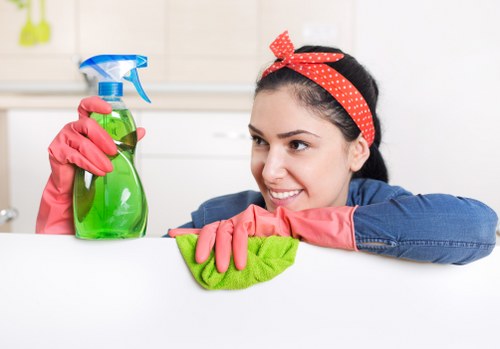 Staff wearing PPE during professional carpet cleaning service
